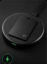 QORZELVA card on a wireless charging pad